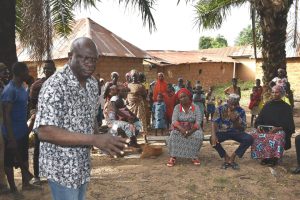 Mr. Yunusa Boyos Climate Change Officer (Left) andMrs. Mary IheonuSocial Livelihood Support Officer addressing the community members at the Palace of the Etsu of Waku.